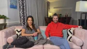Veronica and Tim watch the latest episode with intrigue.