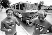 Burlington, VT - (L to R) Jerry Greenfield and Bennett Cohen, the founders of Ben and Jerry Homemade Inc., in front of their Cowmobile in Burlington, VT, on June 15, 1987. They use the modified motor home to distribute samples of their ice-cream during their cross-country trips. (AP Photo/Toby Talbot)