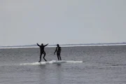 Eric and Rene Potvin standing on the iceberg.
