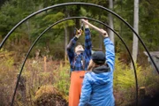 PORT PROTECTION, ALASKA- Hans and Timbi Porter build a greenhouse to grow and protect vegetation near their home.