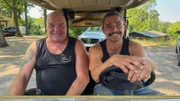 Bagger-Mike and Paul in the golf car
