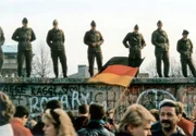 Soldiers on the Berlin Wall.