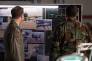 REENACTMENT - Lt. Colonel Ike Stokes (played by Mathieu Bourassa) and another Investigator examine photographs and blueprints of a US Air Force KC-135 to determine why it lost two engines mid-flight during Operation Desert Storm.