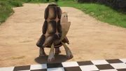 Reggie steht an der Startlinie, um ein Wettrennen gegen Maggie zu gewinnen.