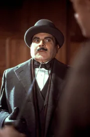 David Suchet (Hercules Poirot).