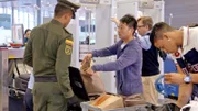 BOGOTA, COLOMBIA- Working in the security line.