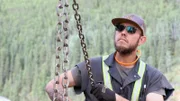 Kevin Beets working with chains
