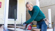 Host Jasmine Roth is thinking of how nice this new deck will be, as seen on HGTV's Hidden Potential.