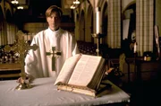 Father Michael Sweeney (Eric Stoltz)