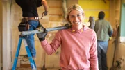 Demolishing the Legg kitchen puts a smile on host Jasmine Roth's face, as seen on HGTV's Hidden Potential.