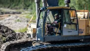 Buzz Legault working in excavator