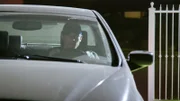 Marcus driving alone at night.