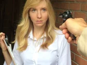 Nancy is threatened with a gun.