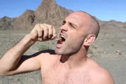 Ed Stafford about to eat a cricket in Mongolia.