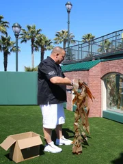 Wayde helps put kelp inside the tank.