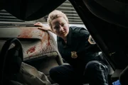 Nachstellung: Polizistin