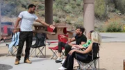 Biniyam Shibre Eshetu, Florian Sukaj, Ariela Weinberg and Stacey Silva sitting around a campfire