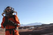 HANKSVILLE, UTAH - Mars Desert Research Station scientist stands atop a ridge overlooking the research station. The Mars Society runs this research station where teams of six simulate conditions of living on Mars.