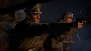REENACTMENT - Kap. Maurer feuert mit seiner Luger auf die anrückenden kanadischen Truppen.