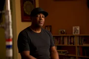 Chuck D sneaks a quick glance at the BTS photographer during the interview.
