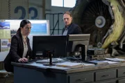 REENACTMENT - The Main Investigator (played by Mark Gibson) and the Second Investigator (played by Jenny Young) analyze all available information to determine what caused the crash UPS Flight 1354.