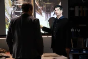 REENACTMENT - The Lead Investigator (played by Mike Shara) and the Second Investigator (played by Wes Berger) analyze photos of the wheel well of downed Propair Flight 420.