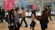 Elizabeth, New Jersey - A participant chooses a pink balloon as part of an experiment that examines male and female color preferences.