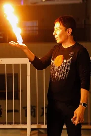 Cyril Takayama demonstrates his fire hand trick.