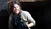 Tatiana Costa looking happy and smiling during clean up