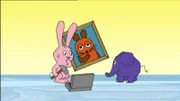 Hase und Elefant wollen ein Bild aufhängen.