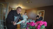 Police officer investigating a house