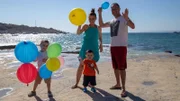 Melissa Shafrir (CL) and Avi Shafrir (R) with their two sons Adam Shafrir (C) and Jordan Shafrir (L) on the beach in the area of Mellieha, Malta, playing with baloons, and enjoying their free time as a family in the new place of living, as seen on Mediterranean Life