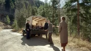 Planwagen mit Grenzgängern.