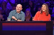 Rateteam-Kapitän Bernhard Hoëcker (l.) mit der Schauspielerin Katharina Wackernagel (r.).