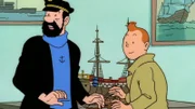 Kapitän Haddock (l.) und Tim (r.) entdecken in einer fremden Wohnung ein weiteres Schiffsmodell der sogenannten "Einhorn."