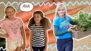 Mira (rechts) zeigt den Schwestern Aljona (links) und Elea (Mitte), welche anderen Pflanzen gut zu Möhren passen.