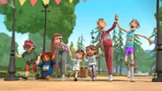 L-R: Mrs. Bird, Paddington, Mrs. Brown, Jonathan Brown, Judy Brown, Mr. Brown, Mr. Curry