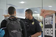 Officer Tai gives directions to a passenger.(National Geographic/Lucky 8 TV)