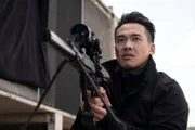 Nile (Jason Wong) hat eine Zielperson ins Visier genommen ohne dass es jemand bemerkt.