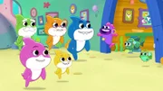 Grandpa Shark (l.), Mommy Shark (2.v.l.), Grandma Shark (3.v.l.), Baby Shark (4.v.l.), Daddy Shark (4.v.r.), Wanda Whirlpool (3.v.r.)