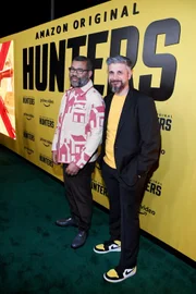 LOS ANGELES, CALIFORNIA - FEBRUARY 19: (L-R) Jordan Peele and Win Rosenfeld attend the World Premiere Of Amazon Original "Hunters" at DGA Theater in Los Angeles.