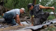 L-R: Dave Turin and pirate Mike Penwell hunt for gold in South Dakota.