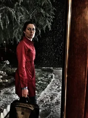 Stephanie Bruner walking out the front door.