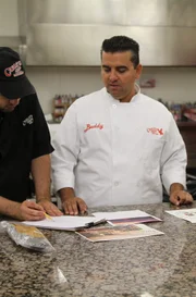The boys plan out the biltong cake.