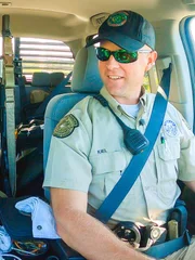 Game Wardens Kiel and Serbanic in truck