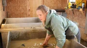 Monica Beets washing mats.