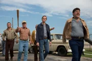 In the middle: Eugene Linwood (Christopher James Baker)
