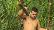 Alex carrying wood.