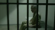 Michael Peterson sits in a jail cell.
