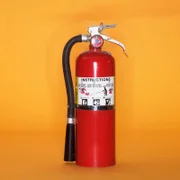 Red Fire Extinguisher --- Image by Burke/Triolo Productions/Brand X/Corbis